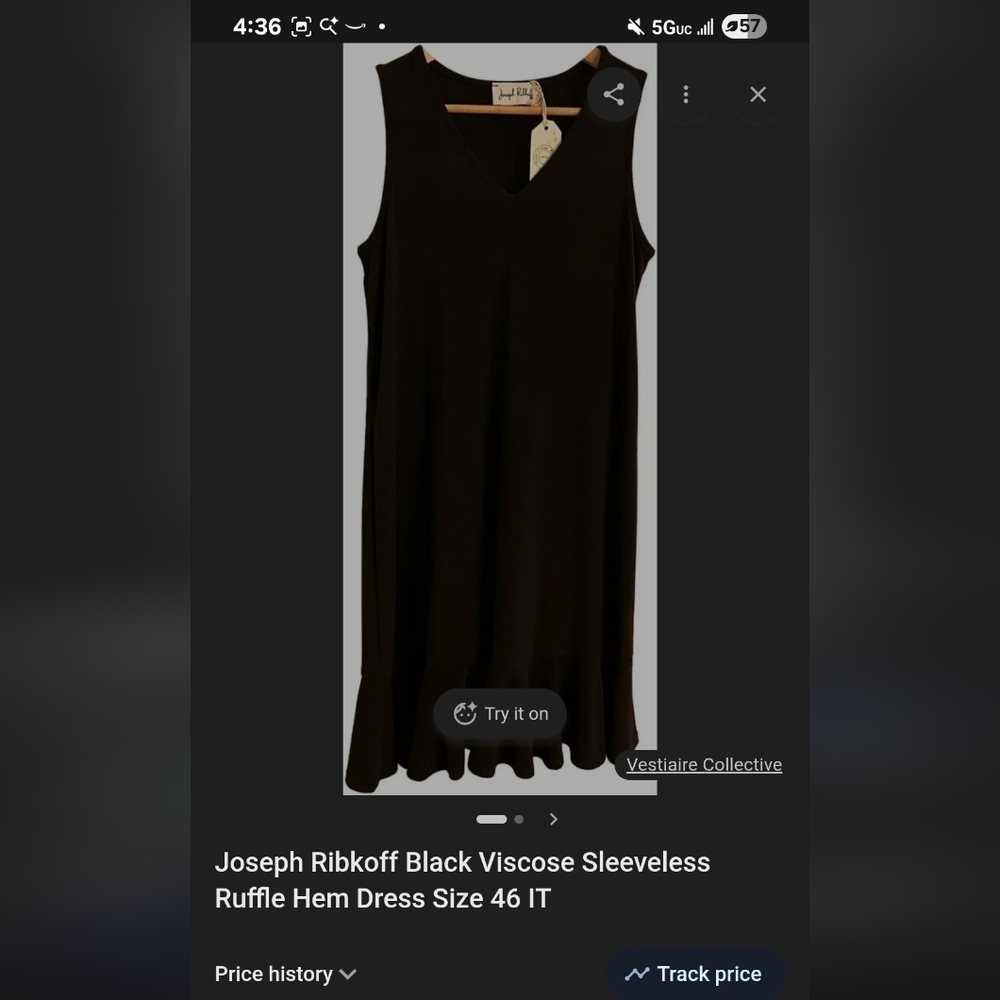 Sleeveless Zippered Dress W Ruffled Bottom